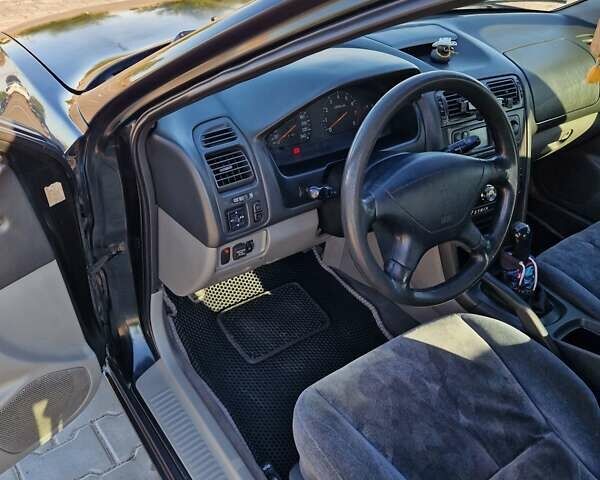 Зеленый Мицубиси Галант, объемом двигателя 2 л и пробегом 384 тыс. км за 3000 $, фото 11 на Automoto.ua