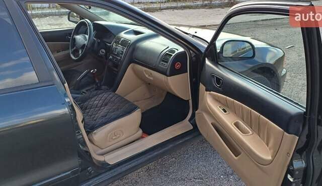 Зеленый Мицубиси Галант, объемом двигателя 2.5 л и пробегом 300 тыс. км за 3100 $, фото 6 на Automoto.ua