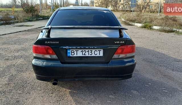 Зеленый Мицубиси Галант, объемом двигателя 2.5 л и пробегом 300 тыс. км за 3100 $, фото 4 на Automoto.ua