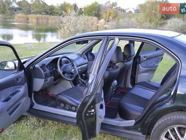 Зелений Міцубісі Галант, об'ємом двигуна 2.5 л та пробігом 335 тис. км за 2000 $, фото 4 на Automoto.ua