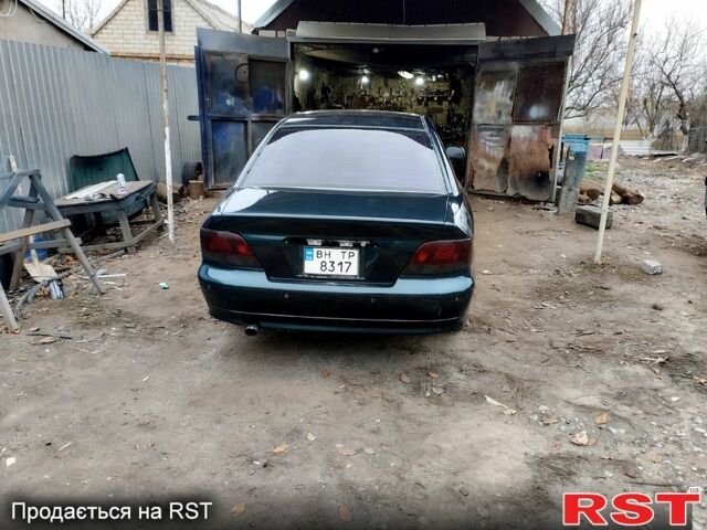 Зелений Міцубісі Галант, об'ємом двигуна 2 л та пробігом 300 тис. км за 4200 $, фото 3 на Automoto.ua