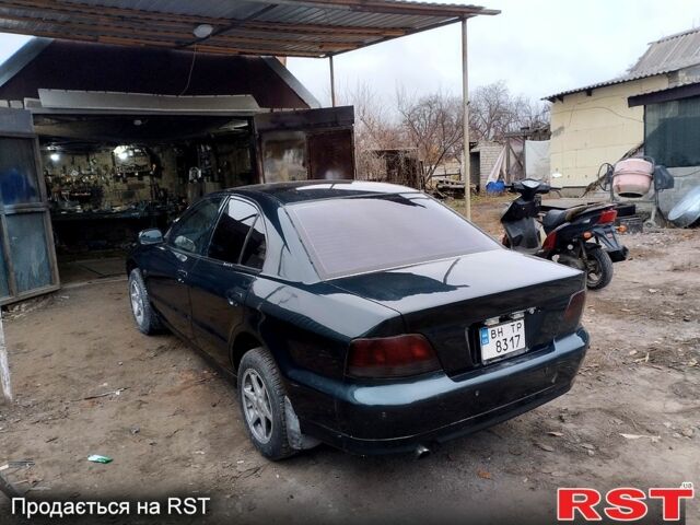 Зелений Міцубісі Галант, об'ємом двигуна 2 л та пробігом 300 тис. км за 4200 $, фото 2 на Automoto.ua