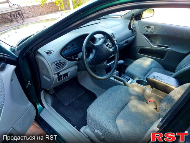 Зелений Міцубісі Галант, об'ємом двигуна 2.4 л та пробігом 280 тис. км за 3600 $, фото 12 на Automoto.ua