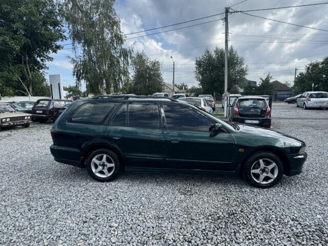 Зелений Міцубісі Галант, об'ємом двигуна 2 л та пробігом 240 тис. км за 2000 $, фото 1 на Automoto.ua