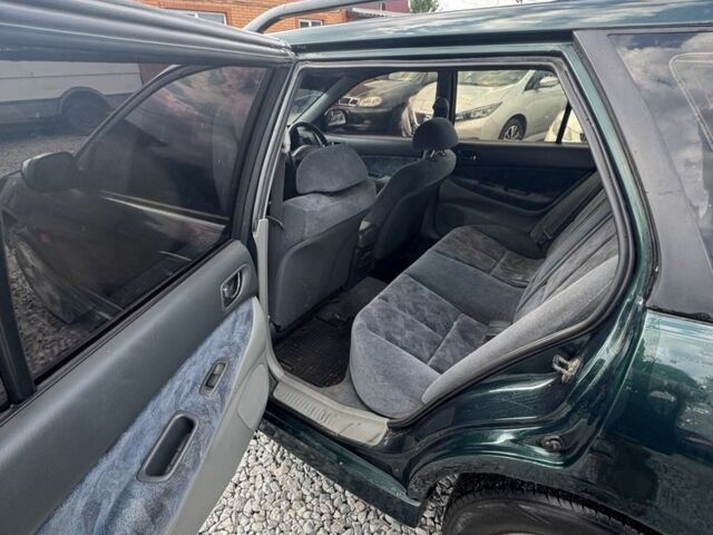 Зелений Міцубісі Галант, об'ємом двигуна 2 л та пробігом 240 тис. км за 2000 $, фото 6 на Automoto.ua