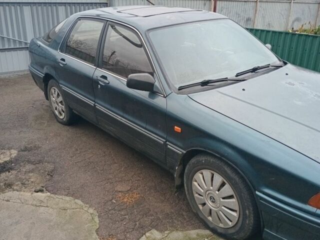 Зелений Міцубісі Галант, об'ємом двигуна 2 л та пробігом 300 тис. км за 1800 $, фото 1 на Automoto.ua