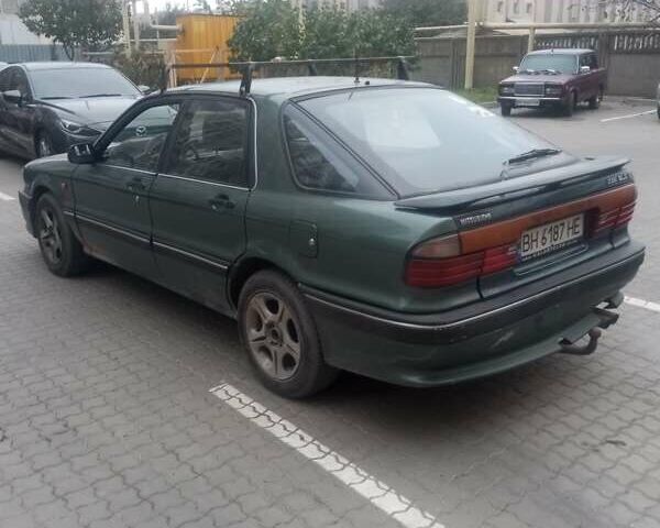 Зелений Міцубісі Галант, об'ємом двигуна 2 л та пробігом 442 тис. км за 1600 $, фото 6 на Automoto.ua