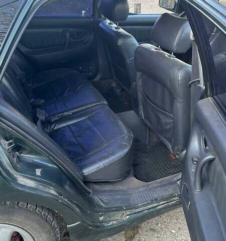 Зелений Міцубісі Галант, об'ємом двигуна 2 л та пробігом 360 тис. км за 2700 $, фото 1 на Automoto.ua