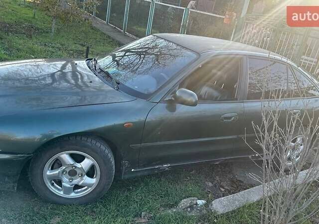 Зелений Міцубісі Галант, об'ємом двигуна 2 л та пробігом 360 тис. км за 2700 $, фото 2 на Automoto.ua