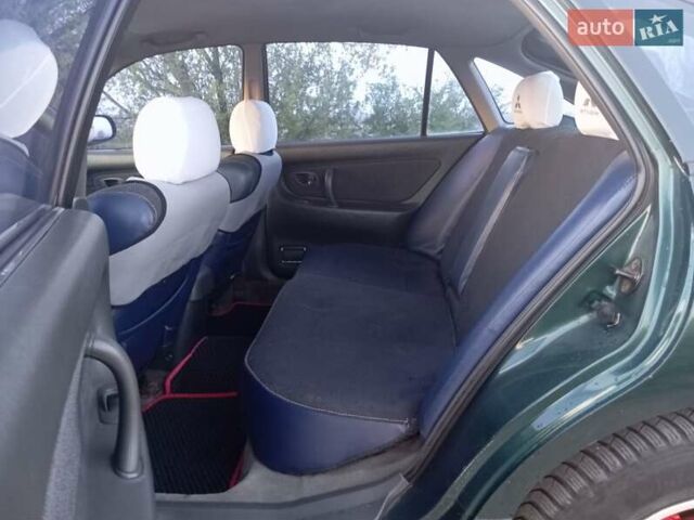 Зеленый Мицубиси Галант, объемом двигателя 2 л и пробегом 325 тыс. км за 2400 $, фото 20 на Automoto.ua