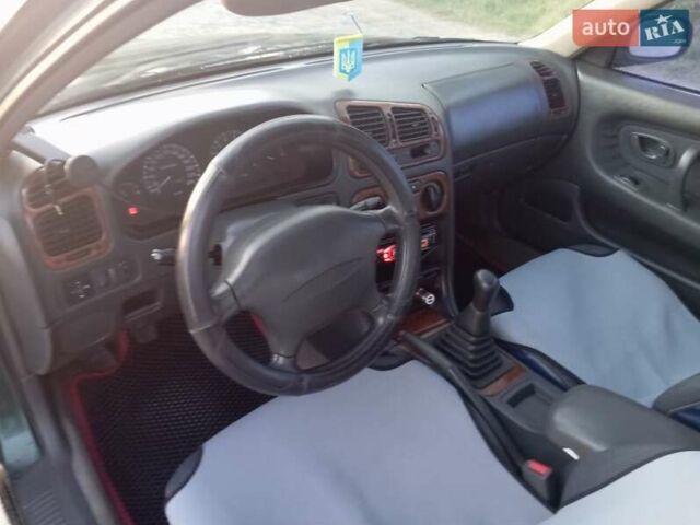 Зеленый Мицубиси Галант, объемом двигателя 2 л и пробегом 325 тыс. км за 2400 $, фото 1 на Automoto.ua