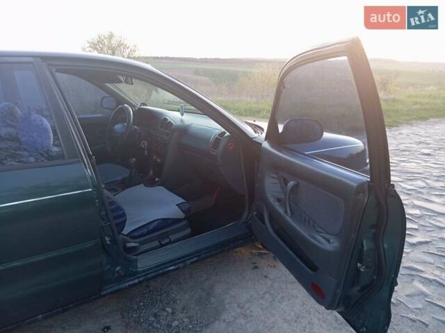 Зеленый Мицубиси Галант, объемом двигателя 2 л и пробегом 325 тыс. км за 2400 $, фото 16 на Automoto.ua