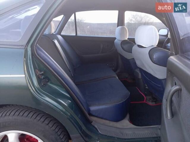 Зеленый Мицубиси Галант, объемом двигателя 2 л и пробегом 325 тыс. км за 2400 $, фото 19 на Automoto.ua