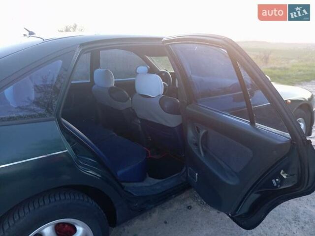 Зеленый Мицубиси Галант, объемом двигателя 2 л и пробегом 325 тыс. км за 2400 $, фото 14 на Automoto.ua