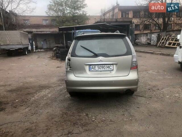 Бежевый Мицубиси Грандис, объемом двигателя 2.38 л и пробегом 200 тыс. км за 3500 $, фото 1 на Automoto.ua