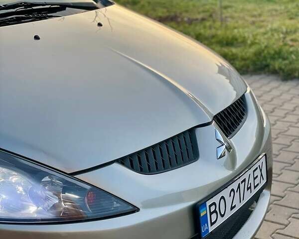 Бежевый Мицубиси Грандис, объемом двигателя 2.38 л и пробегом 74 тыс. км за 7200 $, фото 11 на Automoto.ua