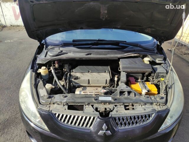 Мицубиси Грандис 2008 в Киеве на Automoto.ua Черный Мицубиси Грандис, объемом двигателя 2.4 л и пробегом 185 тыс. км за 7600 $, фото 5 на Automoto.ua