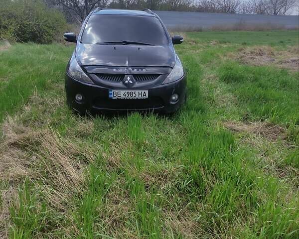 Черный Мицубиси Грандис, объемом двигателя 2.4 л и пробегом 323 тыс. км за 5500 $, фото 2 на Automoto.ua