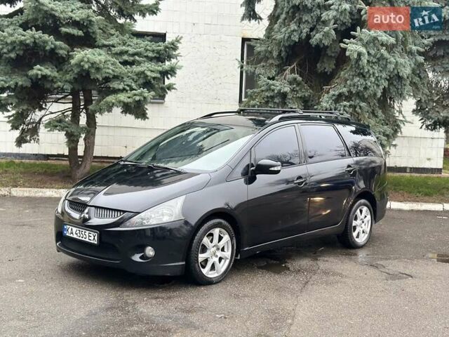 Черный Мицубиси Грандис, объемом двигателя 2.4 л и пробегом 290 тыс. км за 4650 $, фото 7 на Automoto.ua