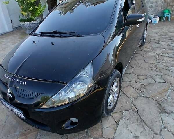 Черный Мицубиси Грандис, объемом двигателя 2.4 л и пробегом 323 тыс. км за 5500 $, фото 5 на Automoto.ua