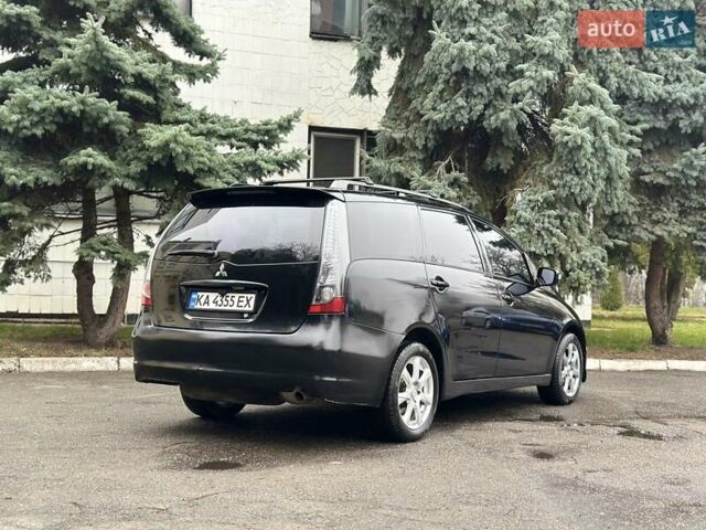 Черный Мицубиси Грандис, объемом двигателя 2.4 л и пробегом 290 тыс. км за 4650 $, фото 16 на Automoto.ua