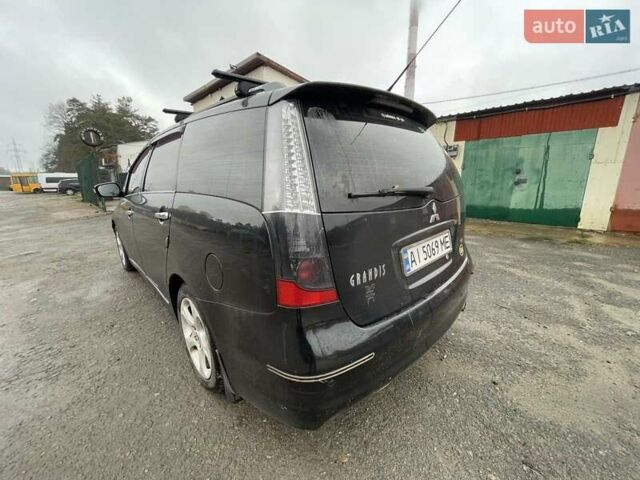 Черный Мицубиси Грандис, объемом двигателя 2.4 л и пробегом 311 тыс. км за 5350 $, фото 2 на Automoto.ua