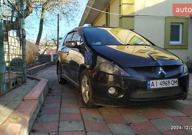 Черный Мицубиси Грандис, объемом двигателя 2.4 л и пробегом 282 тыс. км за 5400 $, фото 6 на Automoto.ua