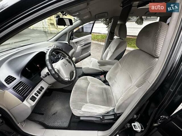 Черный Мицубиси Грандис, объемом двигателя 2.4 л и пробегом 290 тыс. км за 4650 $, фото 17 на Automoto.ua