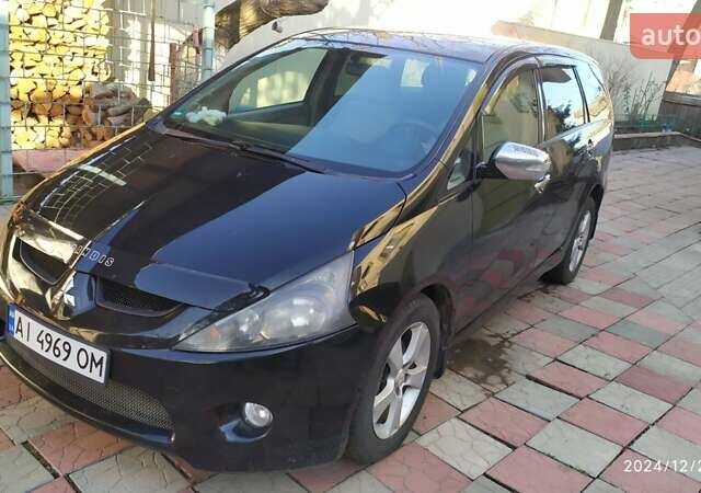 Черный Мицубиси Грандис, объемом двигателя 2.4 л и пробегом 282 тыс. км за 5400 $, фото 8 на Automoto.ua