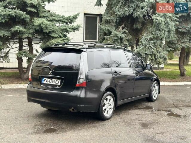 Черный Мицубиси Грандис, объемом двигателя 2.4 л и пробегом 290 тыс. км за 4650 $, фото 4 на Automoto.ua