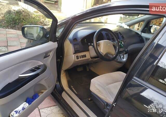 Черный Мицубиси Грандис, объемом двигателя 2.4 л и пробегом 282 тыс. км за 5400 $, фото 13 на Automoto.ua