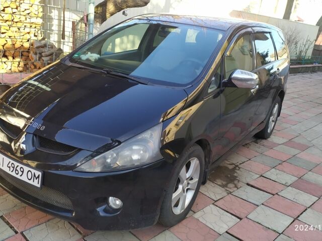 Чорний Міцубісі Грандіс, об'ємом двигуна 2.4 л та пробігом 282 тис. км за 4700 $, фото 1 на Automoto.ua
