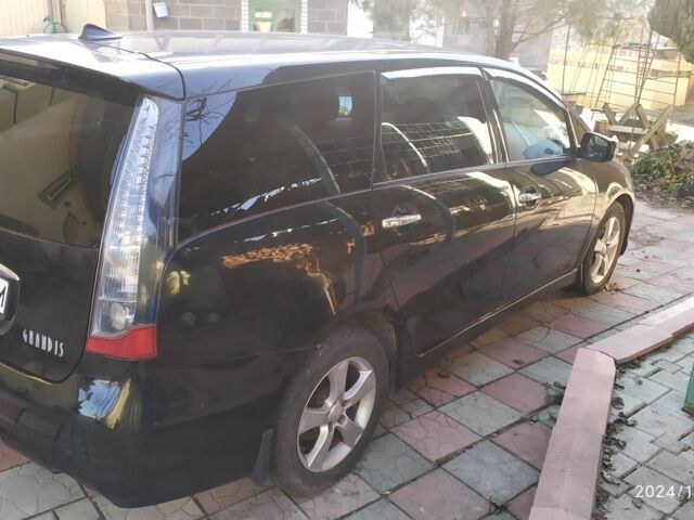 Чорний Міцубісі Грандіс, об'ємом двигуна 2.4 л та пробігом 282 тис. км за 4700 $, фото 12 на Automoto.ua