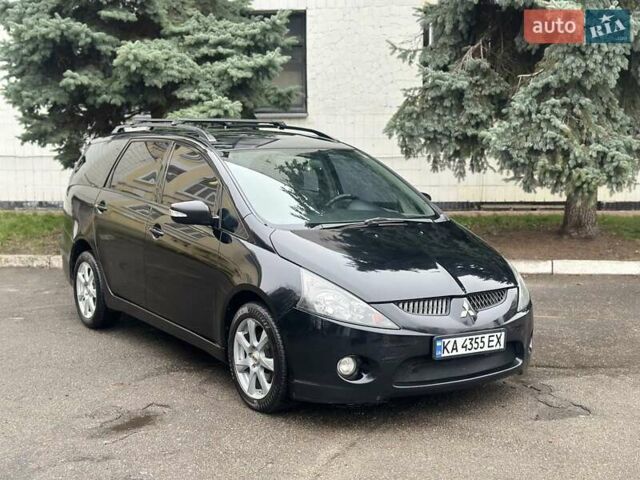 Черный Мицубиси Грандис, объемом двигателя 2.4 л и пробегом 290 тыс. км за 4650 $, фото 1 на Automoto.ua