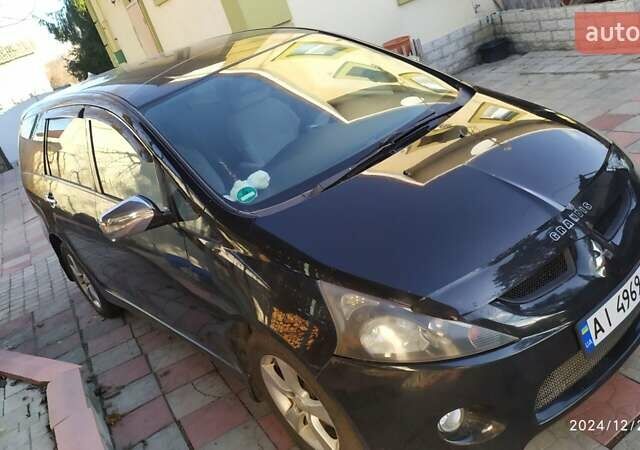 Черный Мицубиси Грандис, объемом двигателя 2.4 л и пробегом 282 тыс. км за 5400 $, фото 5 на Automoto.ua