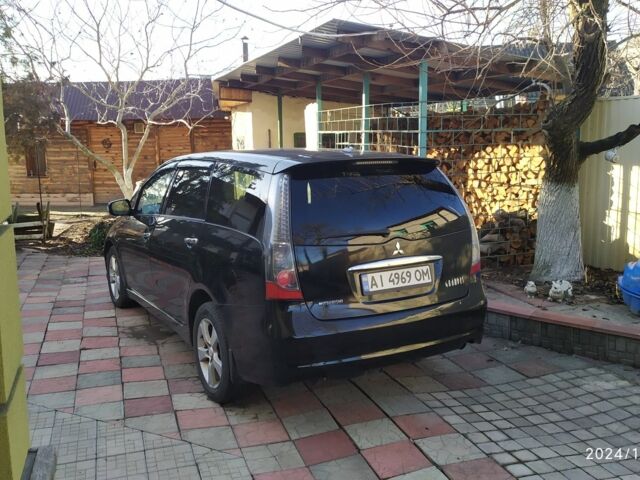 Чорний Міцубісі Грандіс, об'ємом двигуна 2.4 л та пробігом 282 тис. км за 4700 $, фото 3 на Automoto.ua