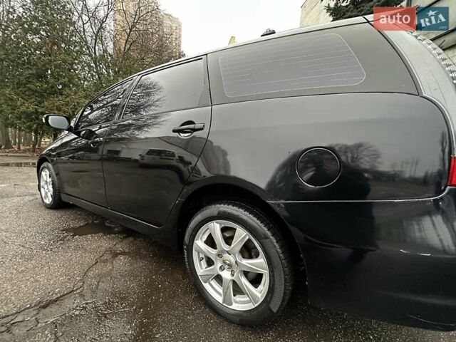 Черный Мицубиси Грандис, объемом двигателя 2.4 л и пробегом 290 тыс. км за 4650 $, фото 10 на Automoto.ua