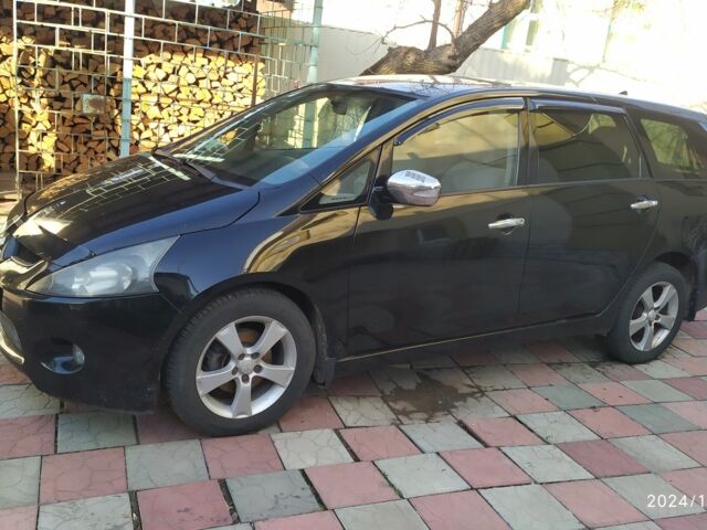 Чорний Міцубісі Грандіс, об'ємом двигуна 2.4 л та пробігом 282 тис. км за 4700 $, фото 10 на Automoto.ua