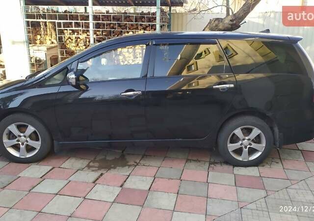 Черный Мицубиси Грандис, объемом двигателя 2.4 л и пробегом 282 тыс. км за 5400 $, фото 4 на Automoto.ua