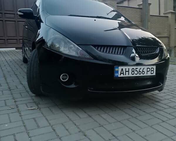 Черный Мицубиси Грандис, объемом двигателя 2.38 л и пробегом 260 тыс. км за 6600 $, фото 3 на Automoto.ua