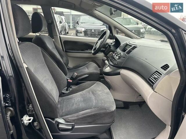 Черный Мицубиси Грандис, объемом двигателя 2.4 л и пробегом 212 тыс. км за 5300 $, фото 23 на Automoto.ua