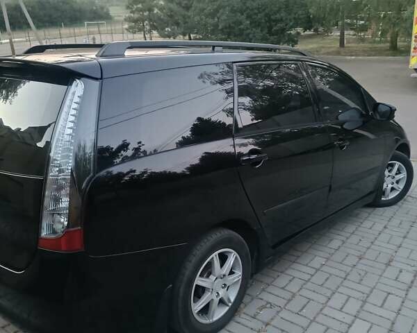 Чорний Міцубісі Грандіс, об'ємом двигуна 2.4 л та пробігом 270 тис. км за 6200 $, фото 5 на Automoto.ua