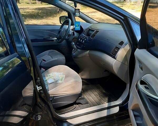 Черный Мицубиси Грандис, объемом двигателя 2.4 л и пробегом 326 тыс. км за 5500 $, фото 7 на Automoto.ua