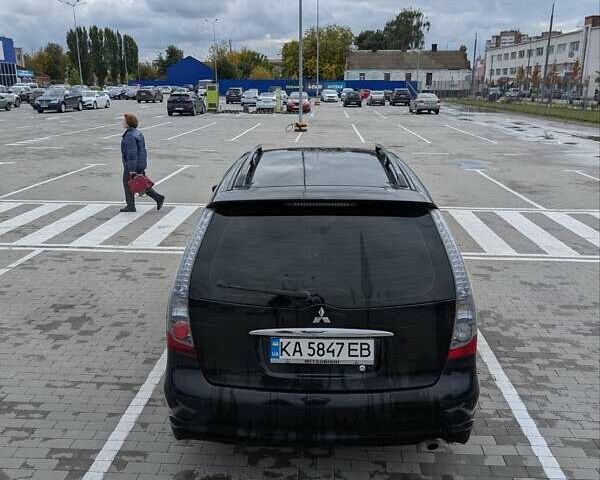Чорний Міцубісі Грандіс, об'ємом двигуна 2.38 л та пробігом 227 тис. км за 5800 $, фото 10 на Automoto.ua