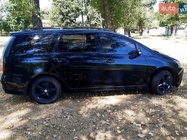 Черный Мицубиси Грандис, объемом двигателя 2.4 л и пробегом 326 тыс. км за 5500 $, фото 5 на Automoto.ua