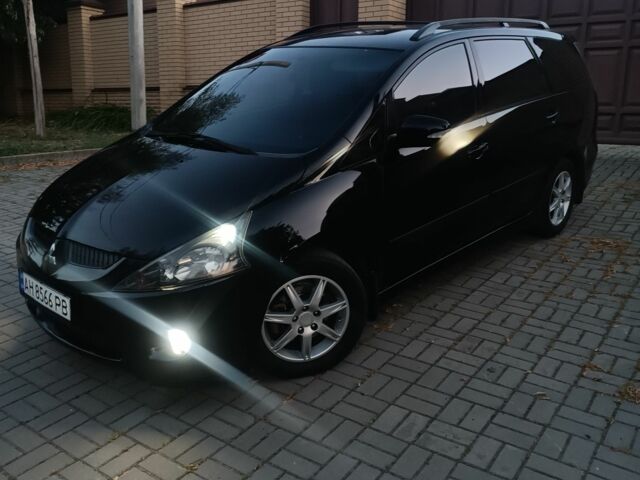 Черный Мицубиси Грандис, объемом двигателя 2.4 л и пробегом 270 тыс. км за 6000 $, фото 2 на Automoto.ua