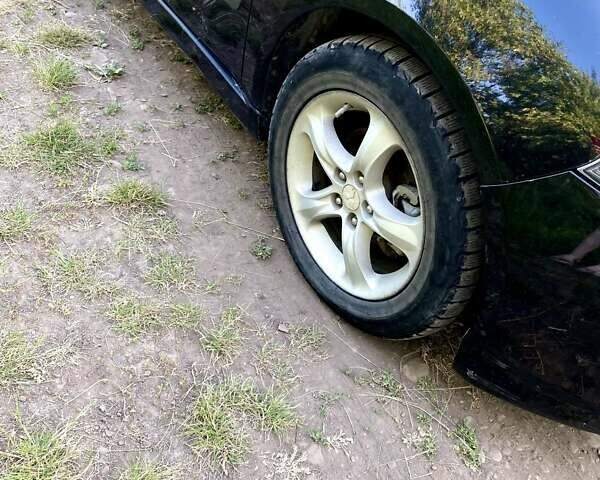 Черный Мицубиси Грандис, объемом двигателя 2 л и пробегом 300 тыс. км за 6350 $, фото 5 на Automoto.ua