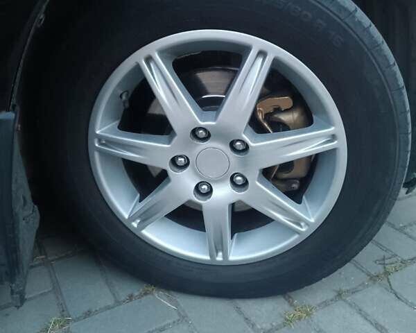 Чорний Міцубісі Грандіс, об'ємом двигуна 2.4 л та пробігом 270 тис. км за 6200 $, фото 26 на Automoto.ua