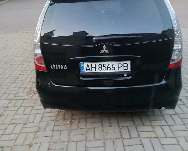 Чорний Міцубісі Грандіс, об'ємом двигуна 2.4 л та пробігом 270 тис. км за 6200 $, фото 1 на Automoto.ua
