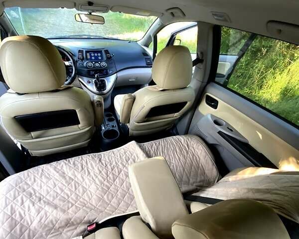 Черный Мицубиси Грандис, объемом двигателя 2 л и пробегом 300 тыс. км за 6350 $, фото 1 на Automoto.ua